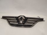 a close up of a car emblem on a white surface