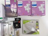 many different types of light bulbs on display on the table