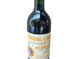 a bottle of wine that is sitting on a table
