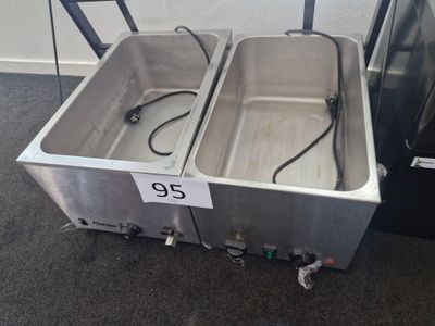 two stainless steel sinks with a price tag on them