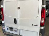 a white van that is parked in a garage