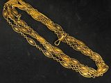 an image of a gold chain with a clasp on it