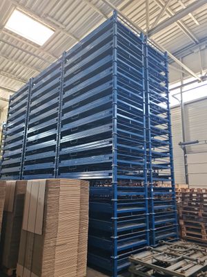 pallet racking in a warehouse with pallets stacked on top of each other