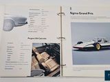 a book with a picture of a racing car on it
