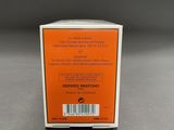 an orange box with a barcode on it sitting on a table