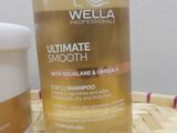 a bottle of shampoo next to a container of shampoo