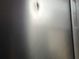 an image of a stainless steel refrigerator in a kitchen
