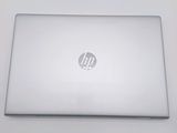 a laptop that is sitting on a white table