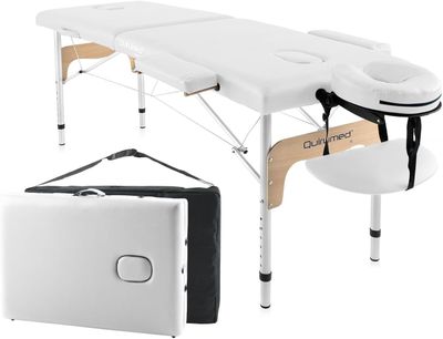 a close up of a table with a laptop on it