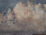 a painting of a boat on the water with clouds in the sky