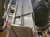 a picture of a large metal structure in a building