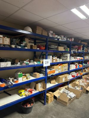 many boxes and boxes on the shelves in the warehouse