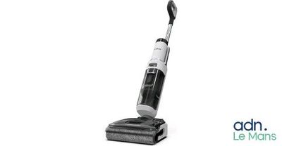 a black and white photo of a vacuum cleaner on a white background