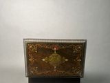 an image of a small wooden box sitting on top of a table