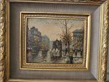 painting of a street scene with a horse drawn carriage in a gold frame