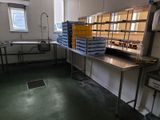 a picture of a kitchen with a lot of food on the counter