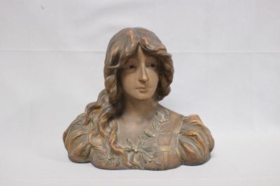 a statue of a woman with long hair on a white background