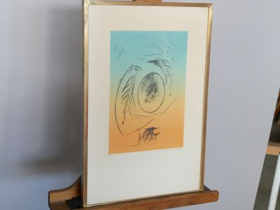 a picture of a painting on a easel in a room