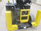 a fork attachment attached to the back of a forklift