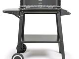 an image of a grill with a laptop on it