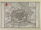 an old map of the city of paris with a red rose on it