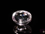 an image of a clear diamond on a black surface