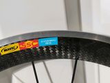 a close up of a bicycle tire with a sticker on it