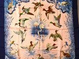 blue and pink silk scarf with ducks in flight over water