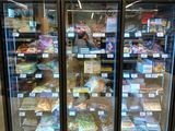 a picture of a refrigerated display case in a grocery store