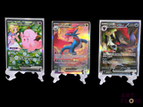 three different pokemon cards are displayed on a black background