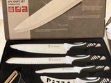 a box with a set of knives and a razor in it