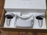 a box with two cups and a cup holder inside of it