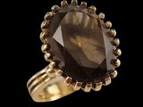 an image of a gold ring with a large smoky quartz stone