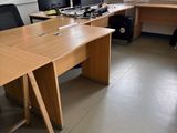 an image of a desk with two monitors and a keyboard