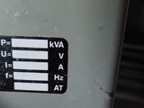 a sticker on the side of a machine that has a flag on it