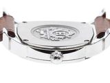 an image of a close up of a watch on a white surface