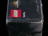 a box of legos sitting on a black surface