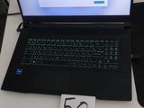 a laptop that is sitting on a table with a price tag on it
