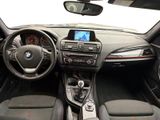 the interior of a car with a steering wheel, dashboard, and dash board