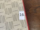 an image of a notebook on a table with a number on it