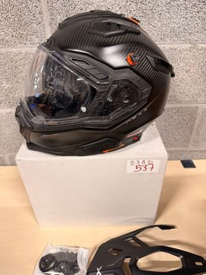 a helmet and goggles sitting on top of a box