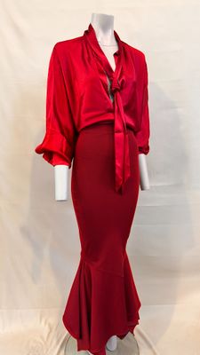 an image of a woman ' s red dress on a mannequin