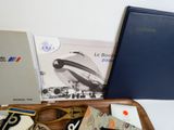 a wooden tray with a bunch of items on it