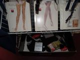 three boxes of stockings and a pair of scissors