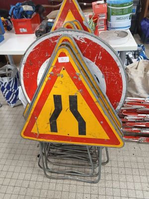 many different signs on the floor in the room