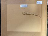 a picture of a box with a pair of scissors in it