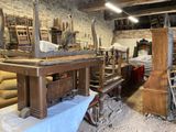 a lot of furniture in a room that is being worked on