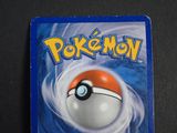 a pokemon card with a poke ball inside of it