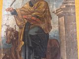 une image représentant un tableau où l'on voit un homme avec une épée et un chien