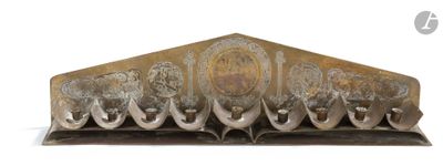 an image of a hanukah menorah made out of metal